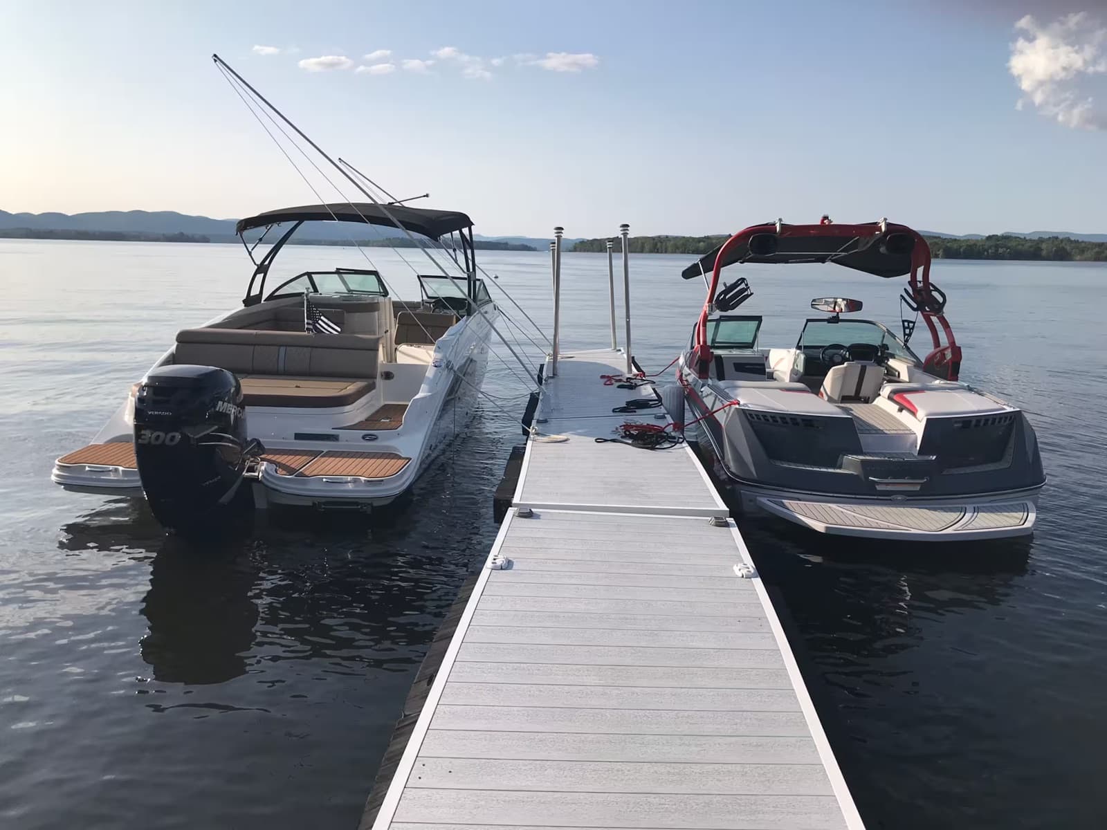 Two boats moored at the private 100-foot dock