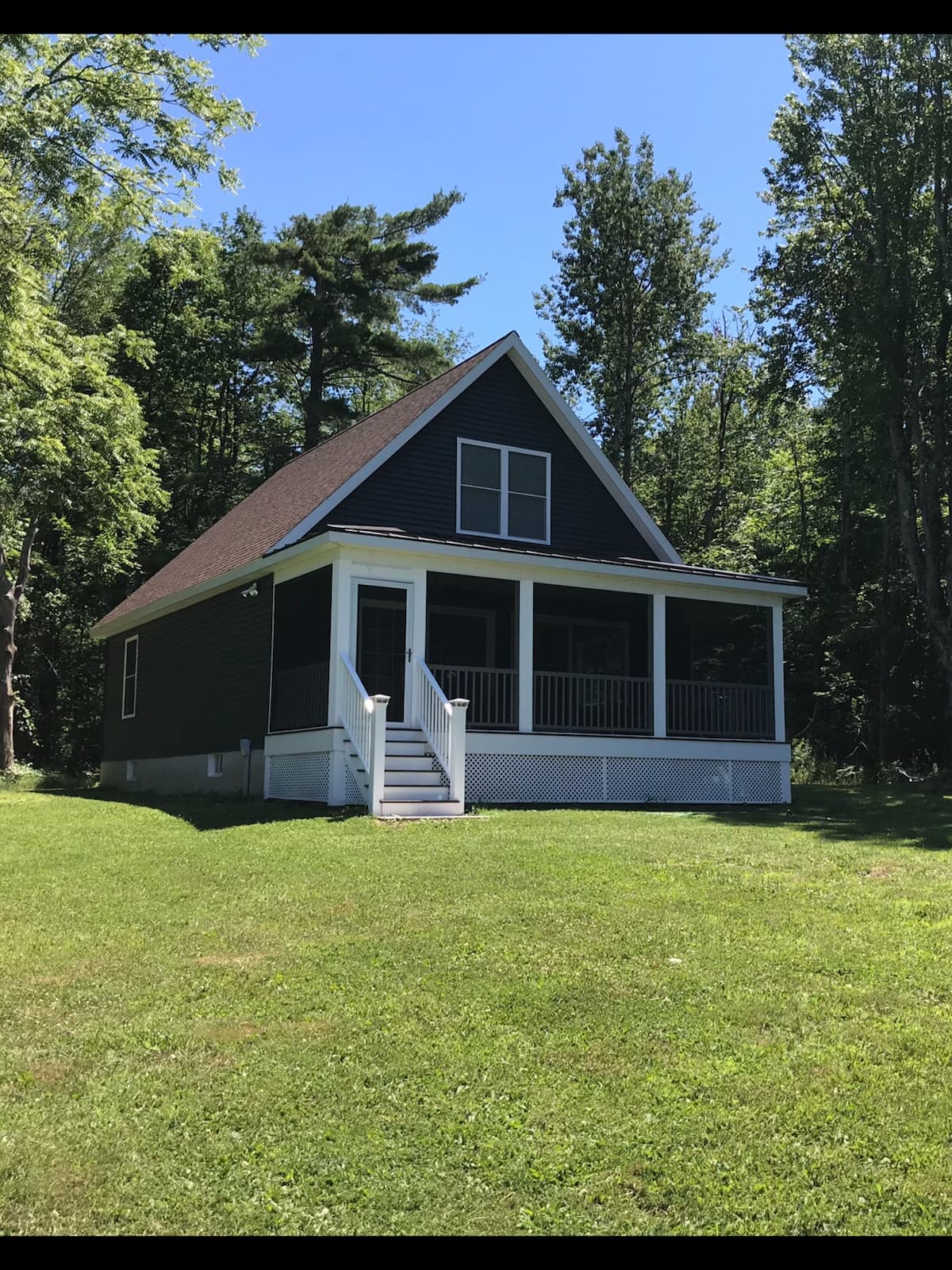 The lakefront cottage in North Broadalbin during summer